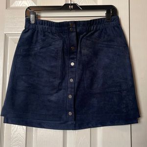 Blue suede skirt with grommets and faux pockets